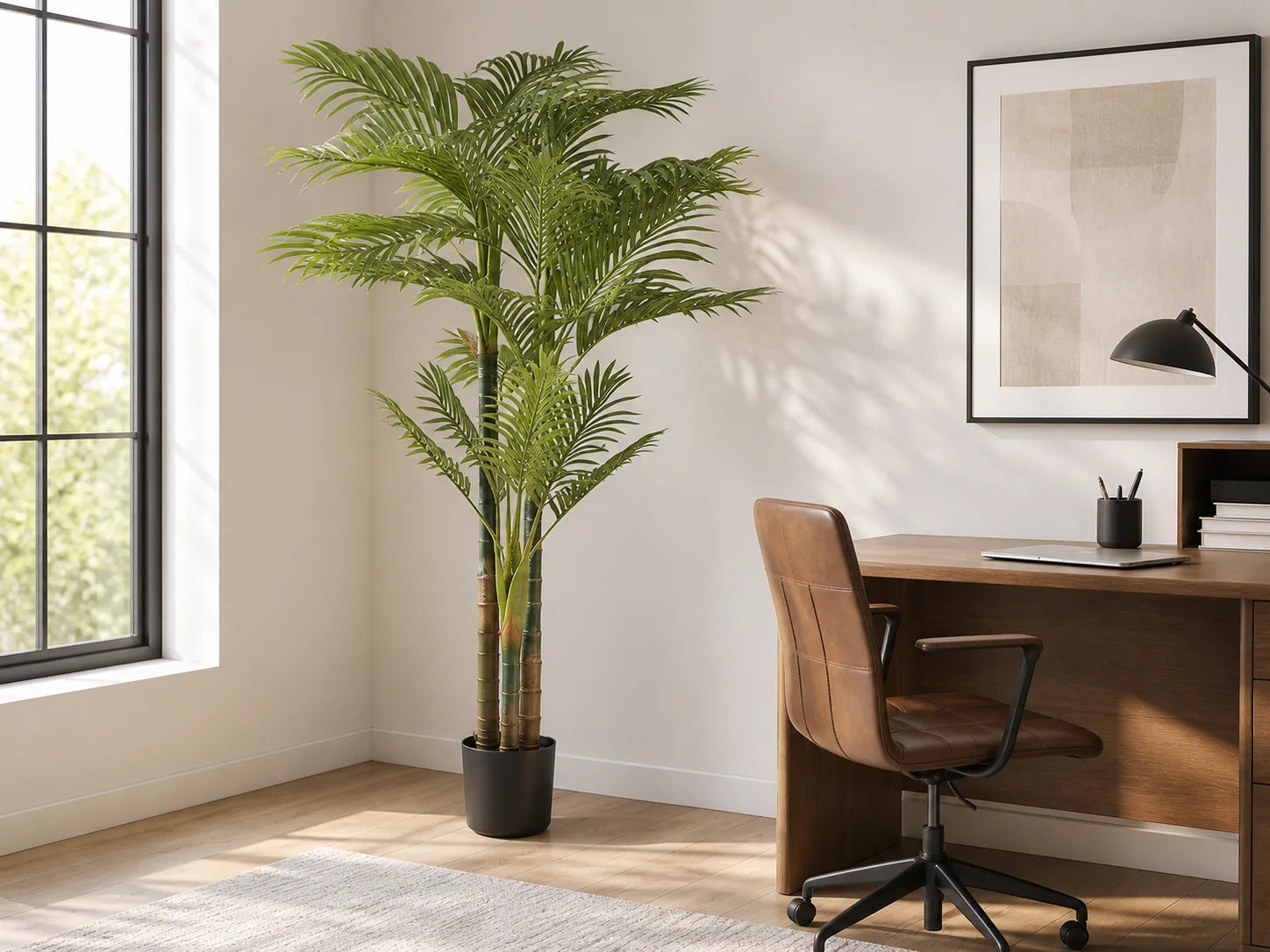 Artificial palm tree placed in a bright room corner